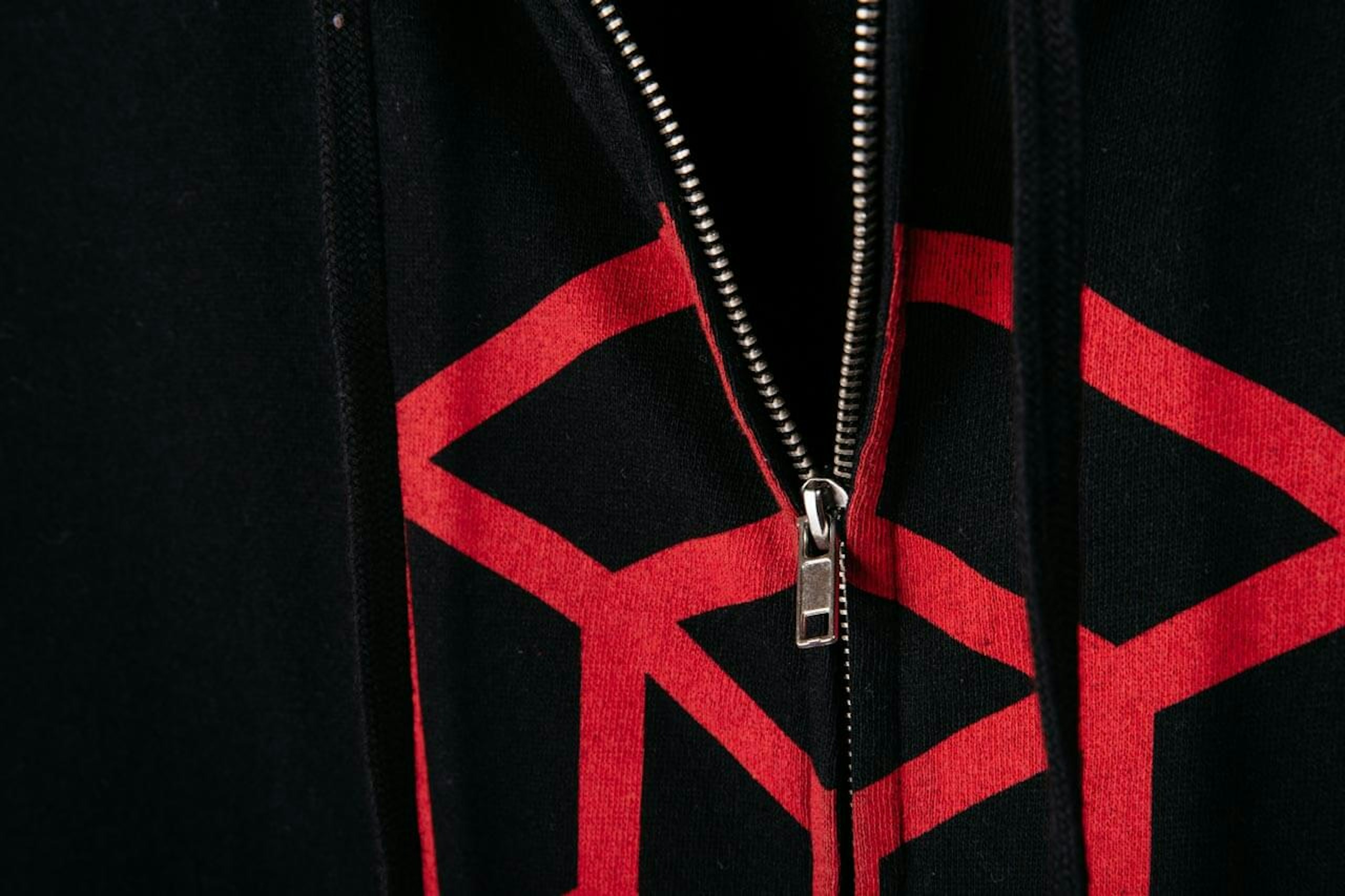 Black sweatshirt with red over the zipper printing