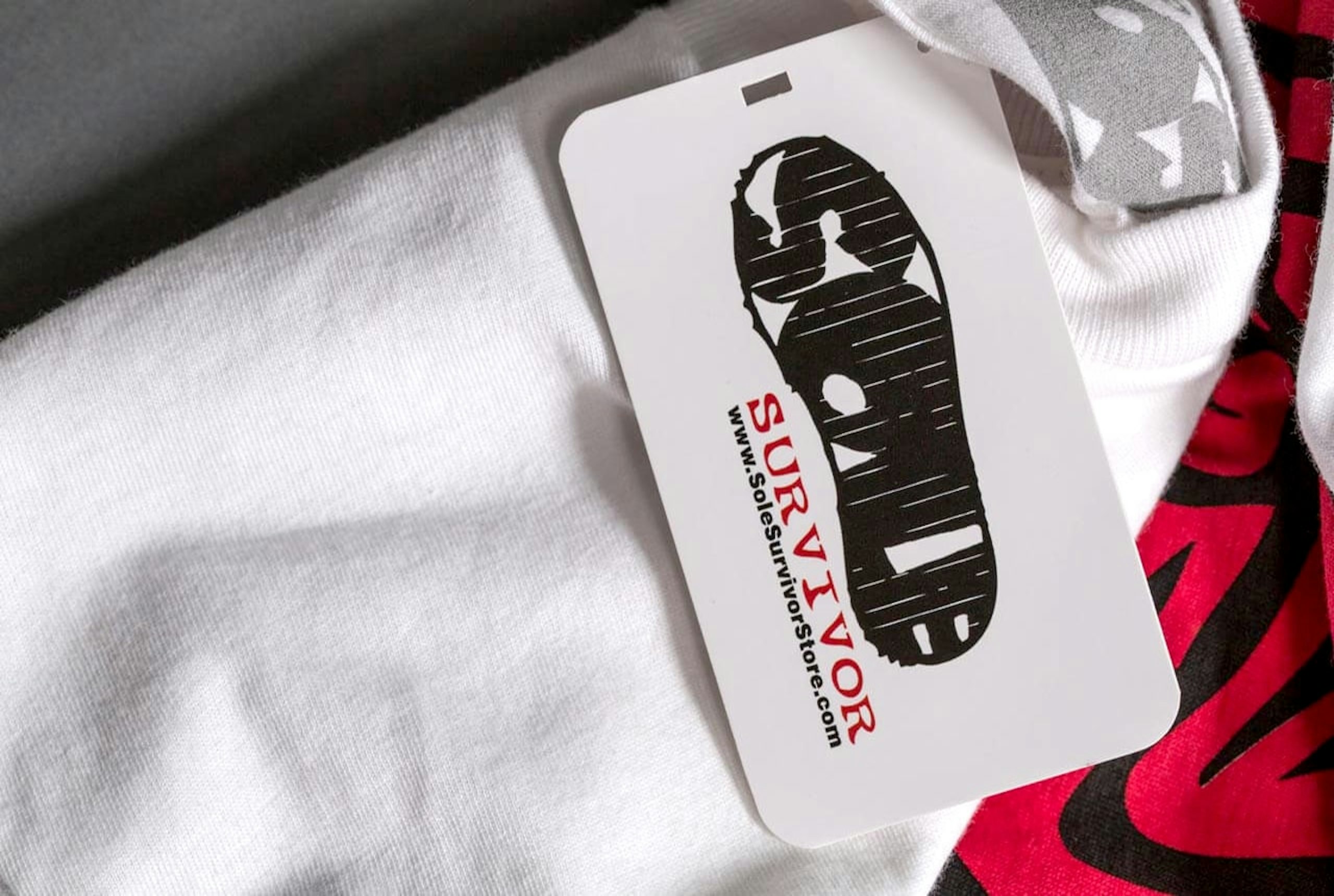 A custom hang tag for Sole Survivor store