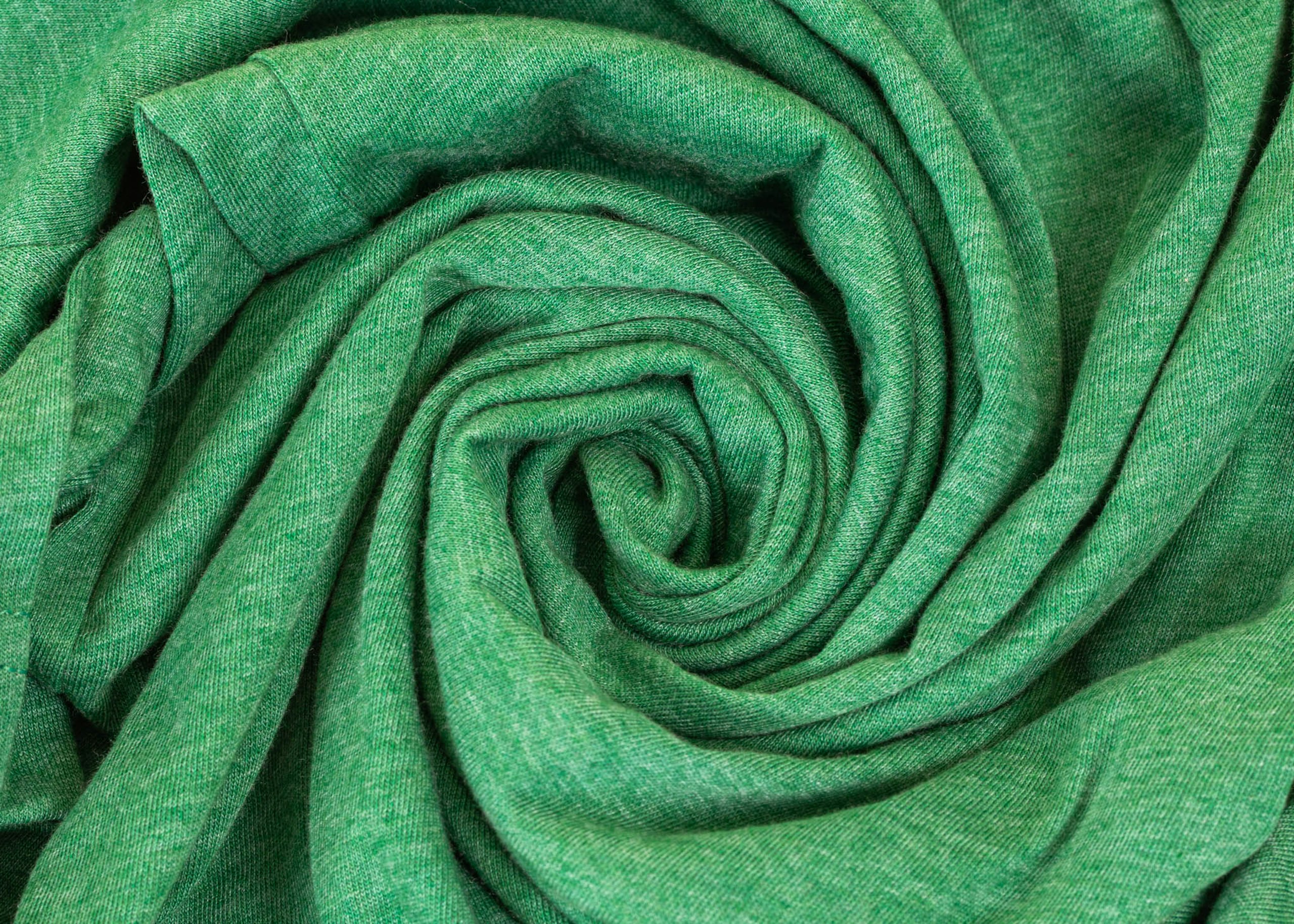 a green shirt swirled into a cool swirly design 