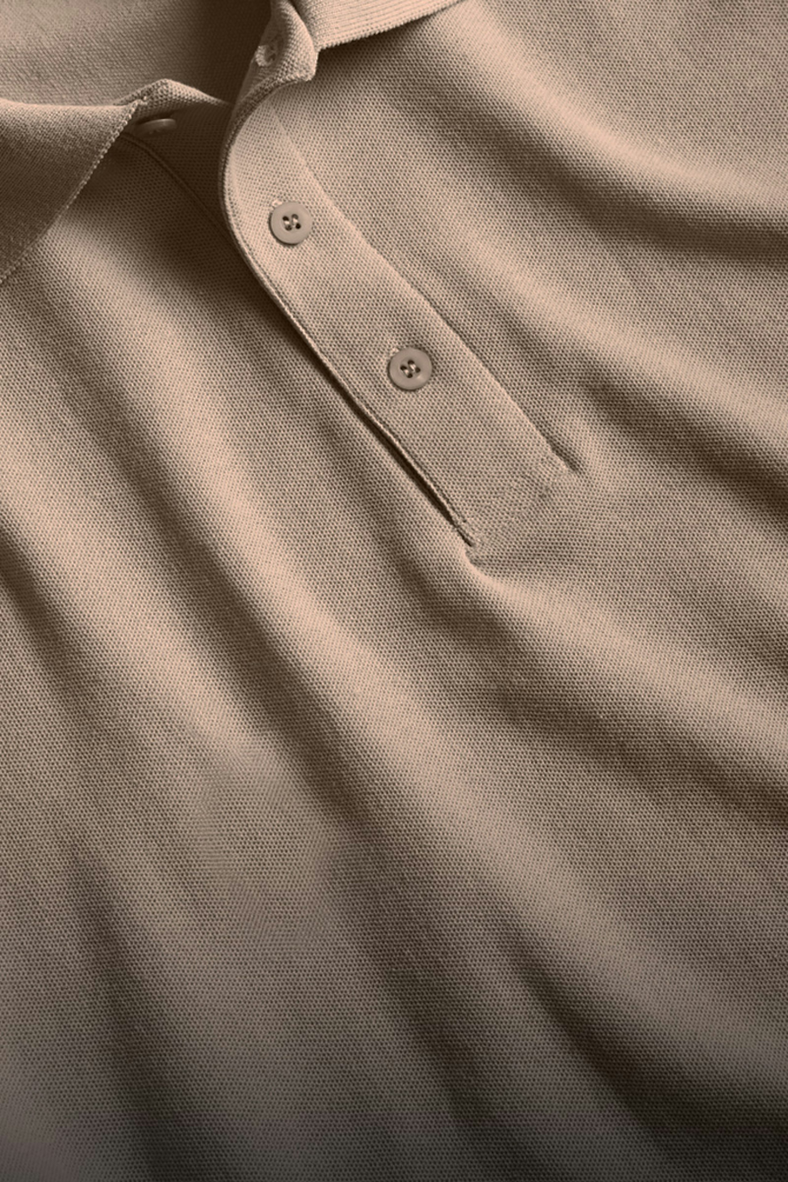 Close up of a tan polo