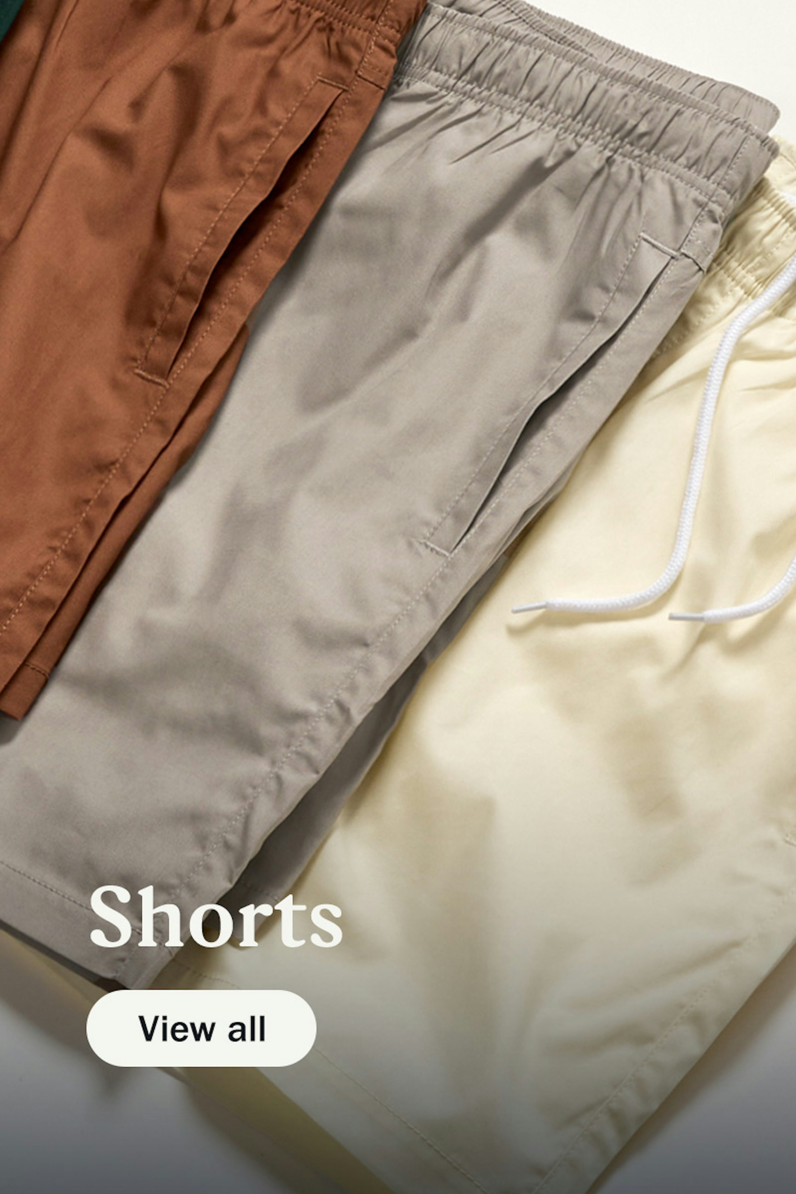 Shorts - view all - three shorts laying flat on top of each other