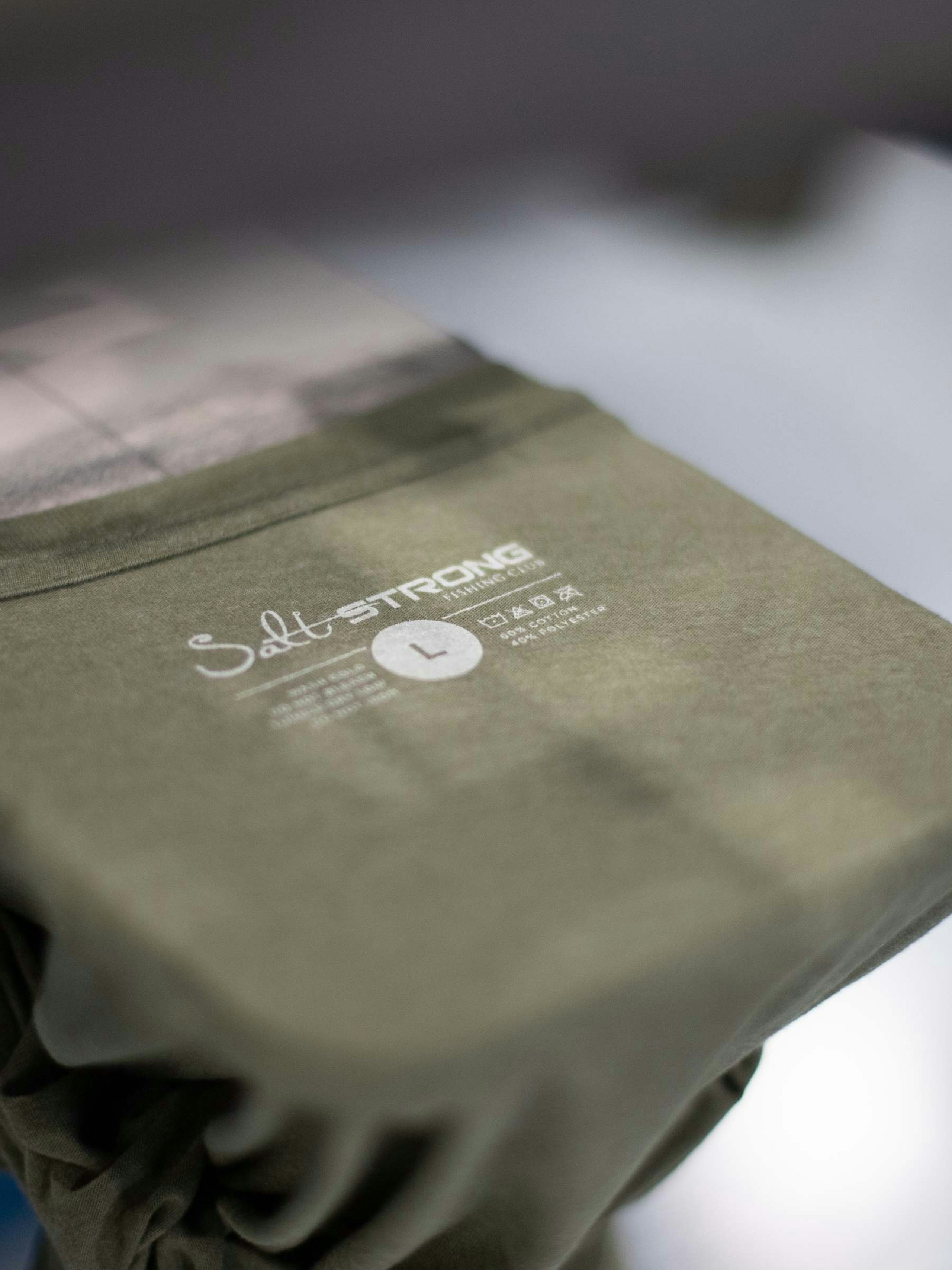 A custom printed tag, just printed and still on the printing press