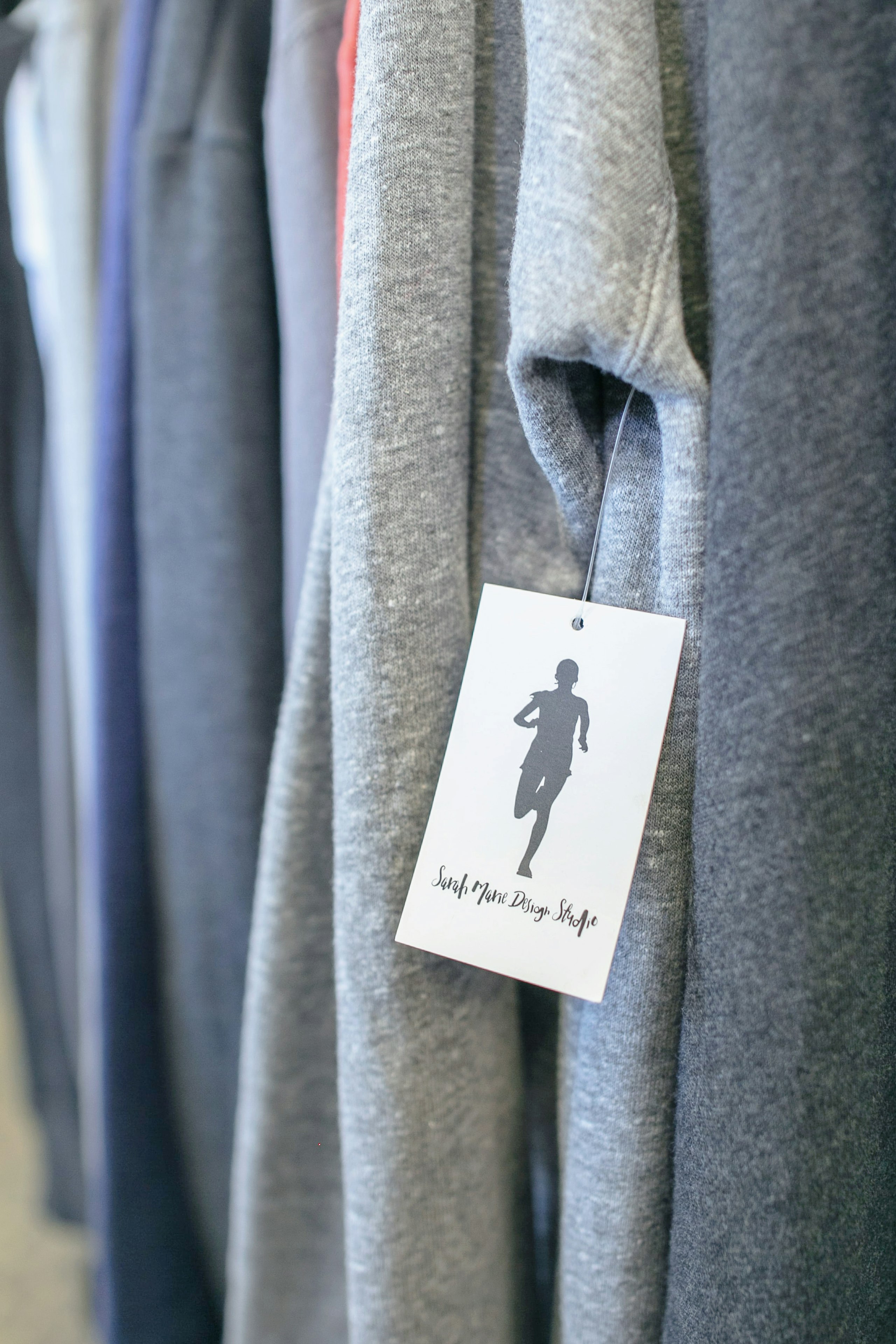 A custom hem tag for Sarah Marie Design Studio