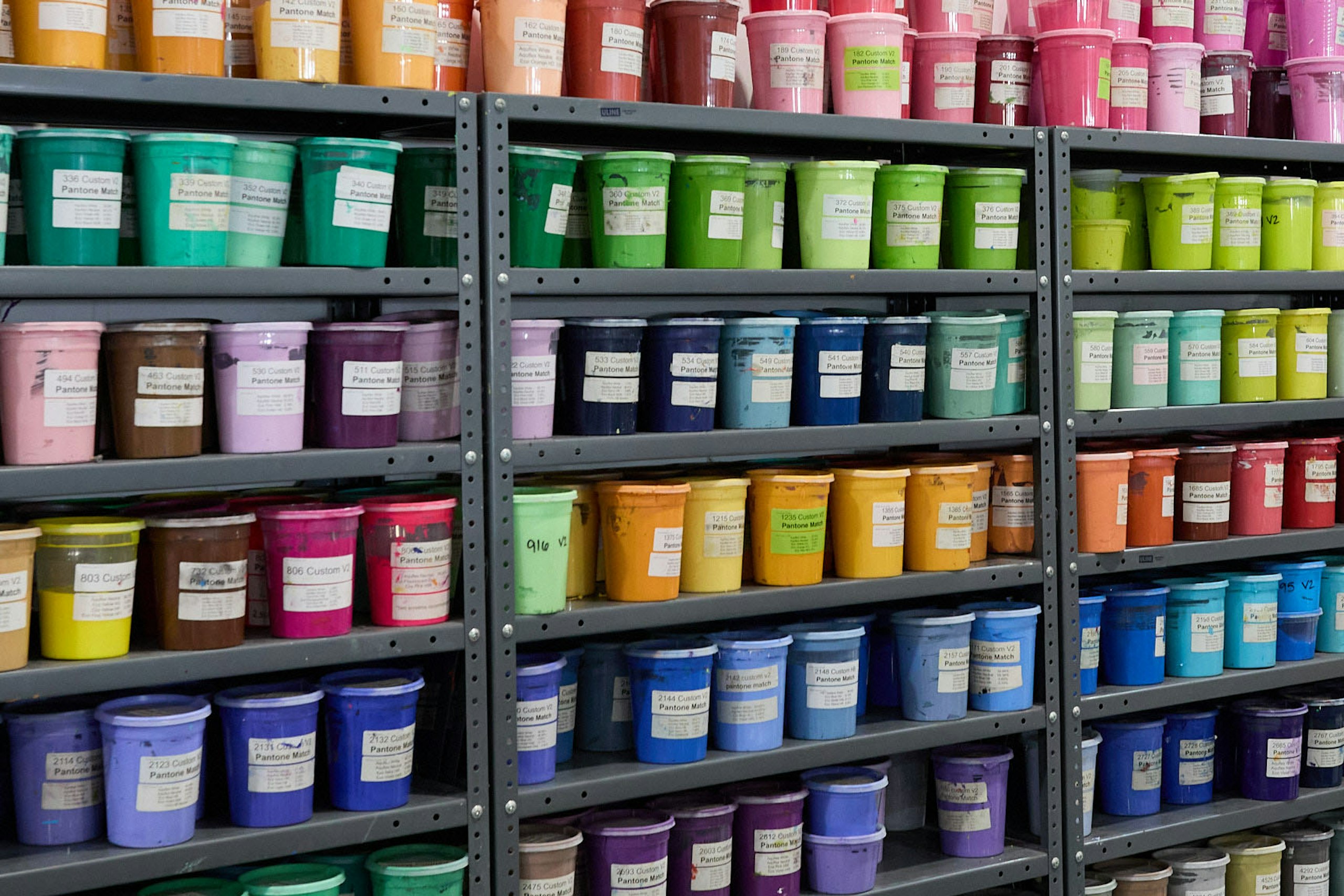 shelves full of different color inks