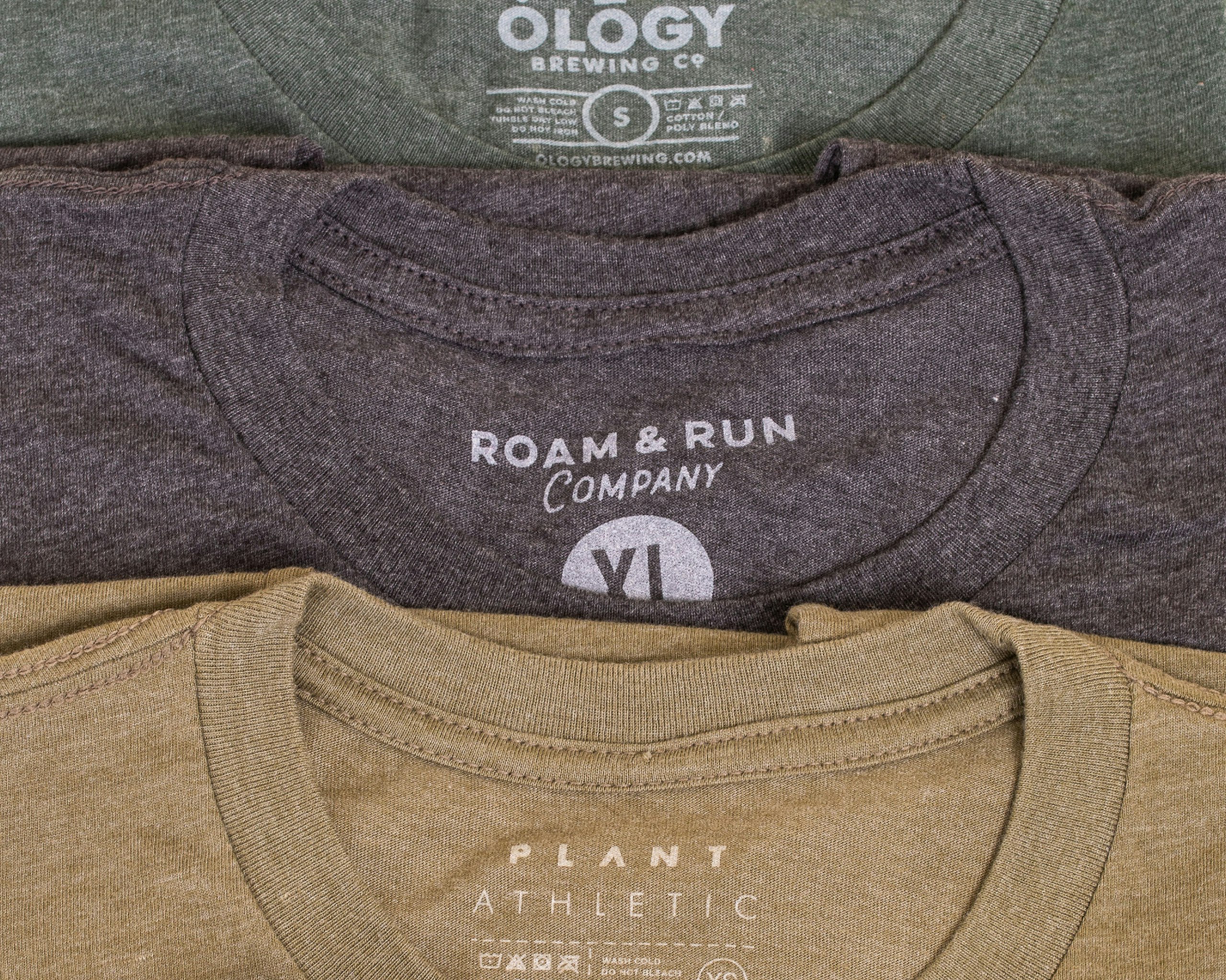 close-up of three t-shirt with tag printing