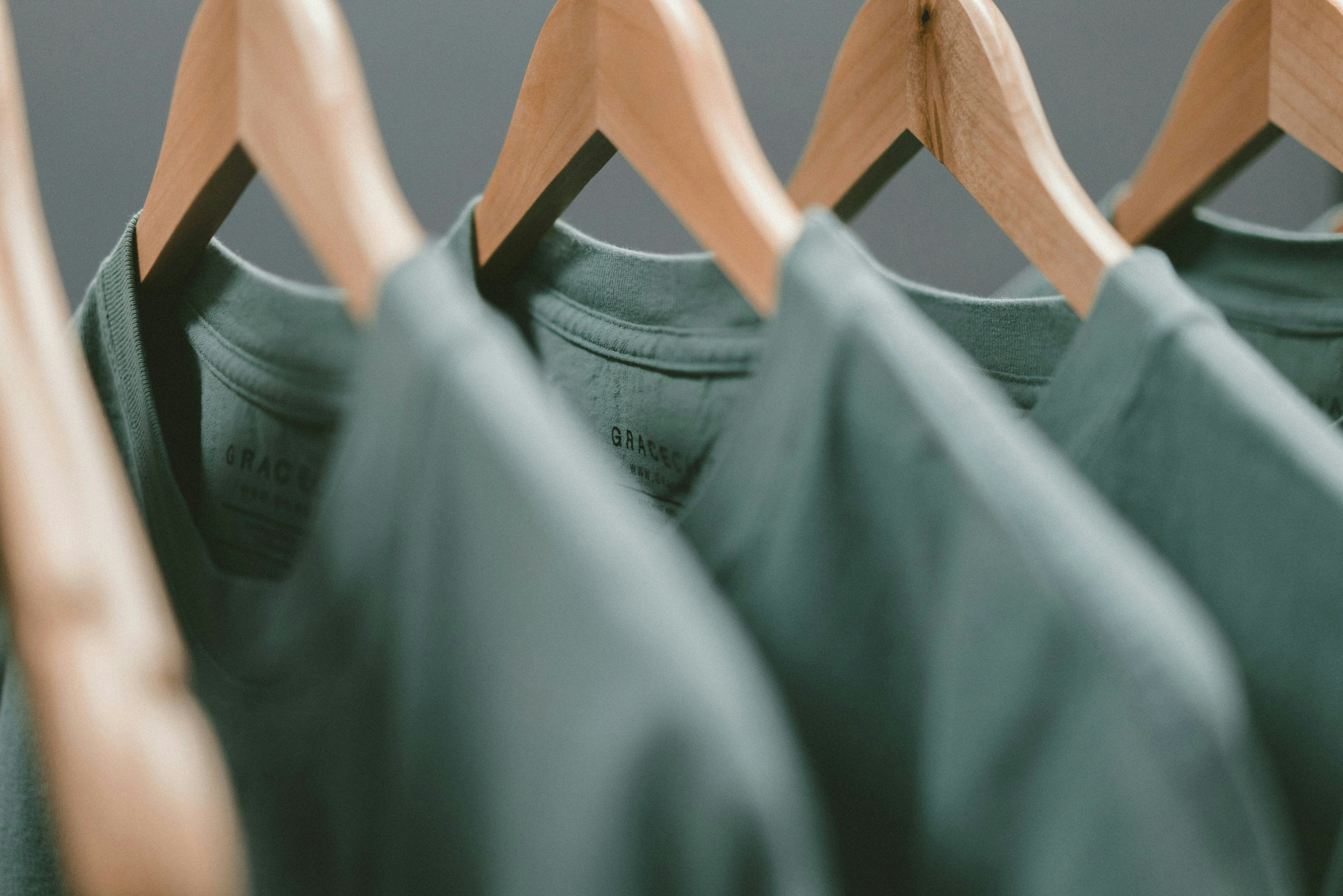 Green Shirts on Clothing Rack