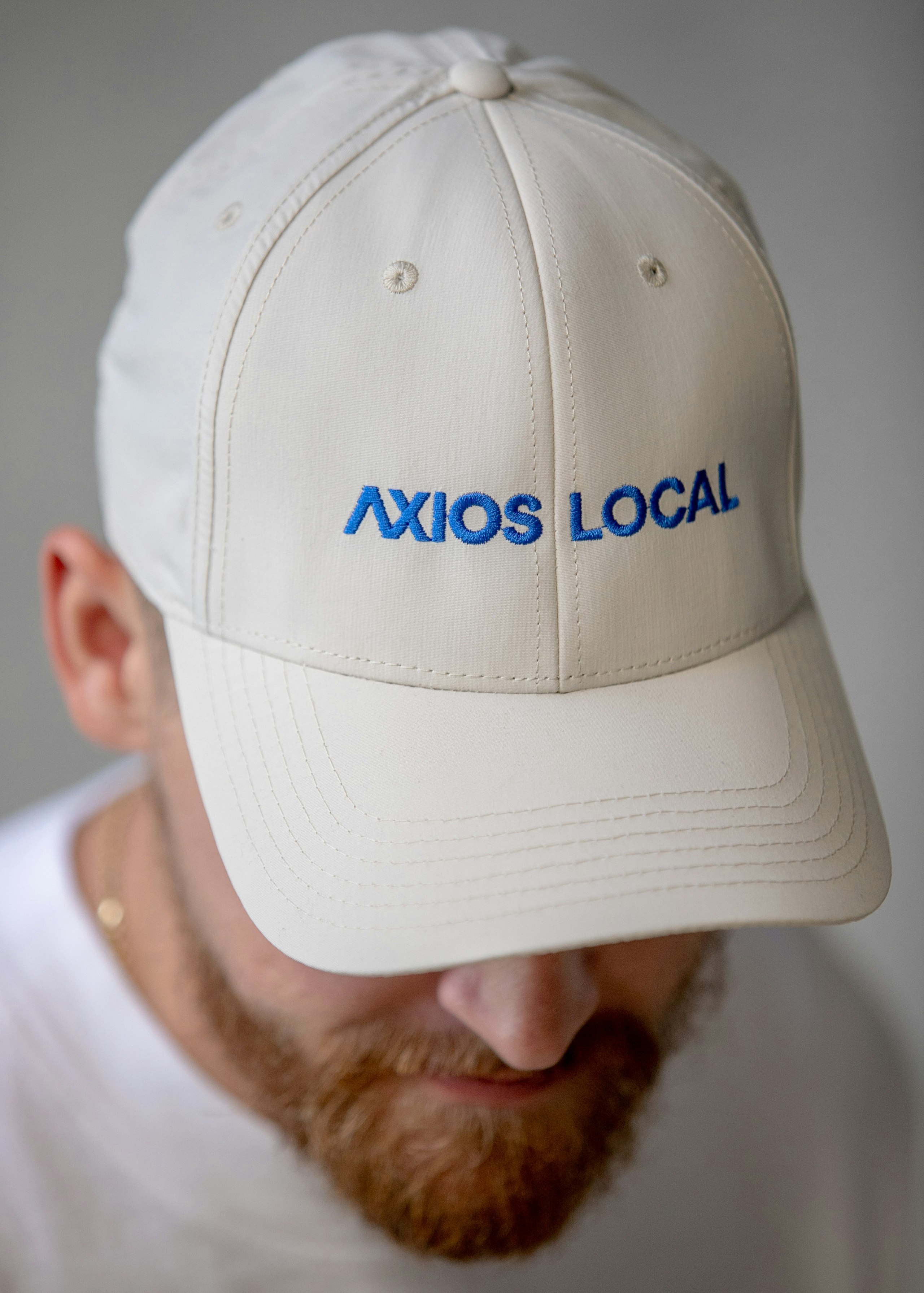 man wearing a white hat