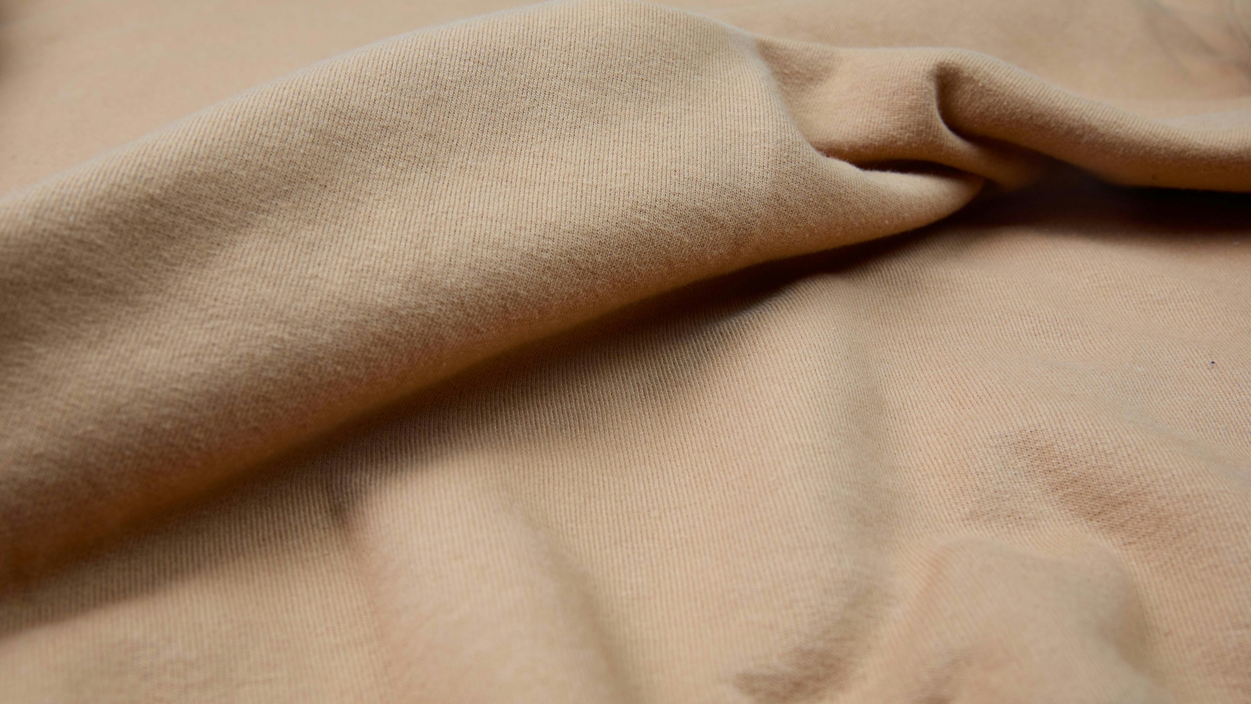 close up of a tan hoodie