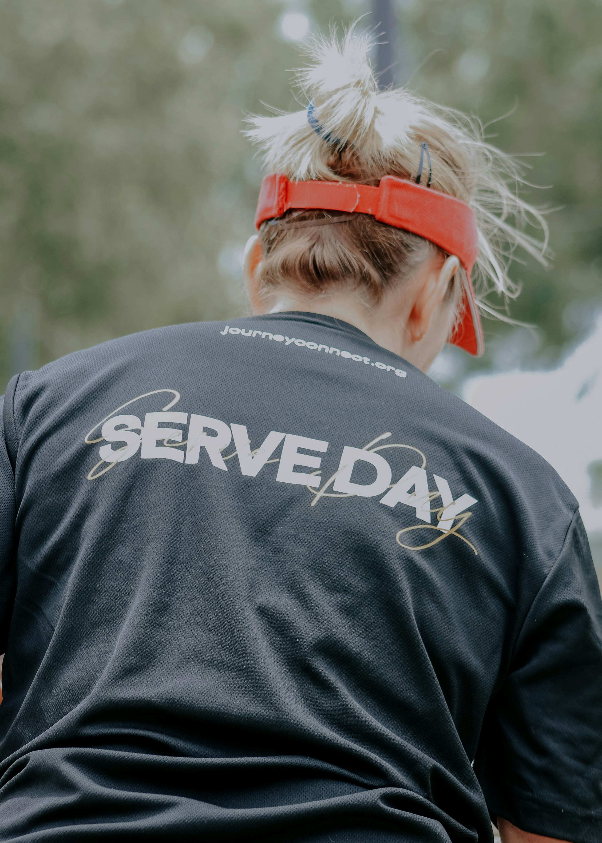 women wearing a black dri-fit black t-shirt